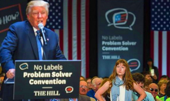 Young woman stands up challenging Trump.  The problem is she was a plant from the Bush campaign. 